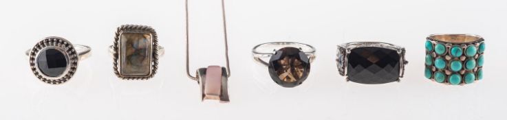 A group of five silver gem set rings, l