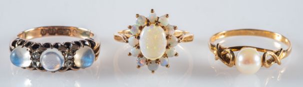 A group of three 9ct yellow gold rings,