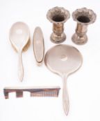 A group of silver comprising of; a pair of silver dressing table vases by Fenton Brothers Ltd,