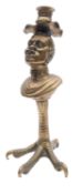 A gilt brass table lighter in the form o