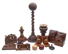 A pair of carved oak wall brackets, utilised as bookends, in Gothic style, circa 1900,