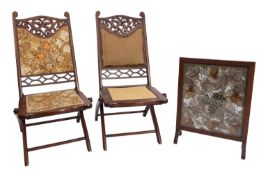 An oak framed and beadwork panel firescreen, in vine pattern decoration, 48cm (1ft 6.