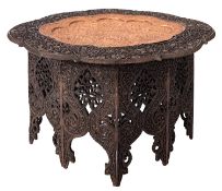 An Anglo Indian carved and stained hardwood and metal inset occasional table, circa 1900,
