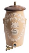 A 19th Century stoneware water cistern with sprigged decoration of Royal Coat of Arms,