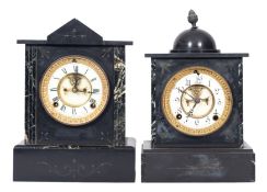 A late Victorian black marble and variegated mantel clock with cupola surmount,