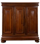 A walnut Hallenschrank, late 19th Century, in 17th Century style, with moulded ogee corners,