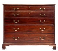 A George III mahogany secretaire chest, circa 1810, the top with a moulded edge,
