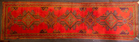 A Turkey rug of traditional design and colours, 244cm x 156cm, also a Turkey runner, 350cm x 93cm,