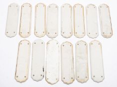 Seven pairs of porcelain finger plates, 18cm long.
