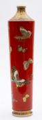 A Satsuma pottery vase of tapering cylindrical form, the iron red body enamelled with butterflies,