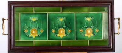 An Edwardian mahogany and brass tray,