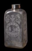 A 19th century Dutch white metal topped copper wheel engraved spirit bottle.