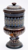 A Doulton Lambeth stoneware water purifier and cover of urn shape decorated with paterae and
