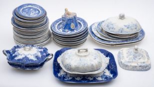 A quantity of various blue and white tablewares including oval meat dishes, tureens etc.