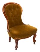 A lady's Victorian walnut nursing chair,
