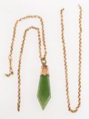 An antique New Zealand greenstone pendant and chain,