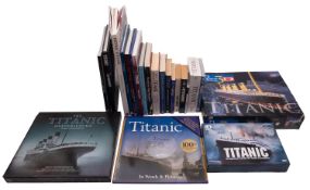 A collection of Titanic related books and collectables, including 'Titanic Survivor.