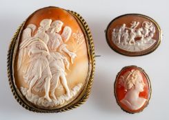 A group of three cameo brooches, includi