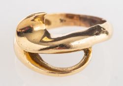 A cross-over designed ring, indistinct m