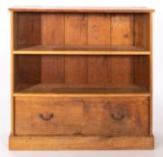 An oak and pine open bookcase, early 20t