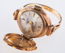 A Rotary watch ring, a 9ct yellow gold r