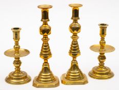 A pair of Victorian brass candlesticks,