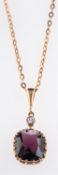A garnet and white sapphire pendant & ch
