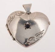 A 9ct white gold heart locket, with foli