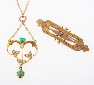 An antique pendant & brooch, an ornate V