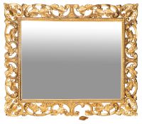 A carved and giltwood framed wall mirror in Florentine 18th century taste,
