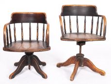 Two similar Victorian oak swivel desk chairs,