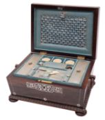 An early Victorian mother of pearl inlaid rosewood sewing box of sarcophagus form with loose ring