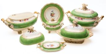 An early 19th century English porcelain part dinner service painted with flower sprays within apple