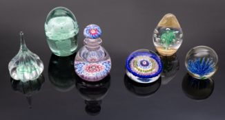 A late 19th century millifiori glass inkwell and stopper and five various paperweights including a