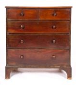 A George IV mahogany chest of drawers, circa 1825; with two short and three long graduating drawers,