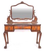 A mahogany dressing table with mirror,