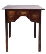 A George I oak 'lowboy' side table, early 18th century; the top with moulded edges,