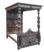 A composite carved oak half-tester bed, 16th,