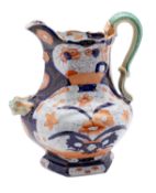 A large Masons Patent Ironstone China jug of shaped hexagonal form with serpent handle,