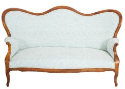 A French walnut and upholstered sofa in 18th century style,