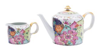 A Mottahedeh porcelain 'Chinese' tobacco leaf teapot, cover and milk jug in late 18th century style,
