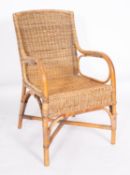 A wicker and bamboo elbow chair, by Dryad of Leicester,