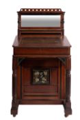 A Victorian mahogany and ebonised composition banded Davenport in Aesthetic Movement style,