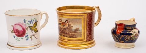 A Staffordshire porcelain mug, painted with flowers,