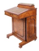 A Victorian burr walnut and marquetry Davenport,