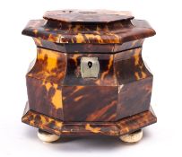 A tortoiseshell and pewter strung tea caddy, second quarter 19th century; of octagonal section,
