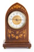 An Edwardian lancet mantel clock and metronome the clock having an eight-day duration timepiece