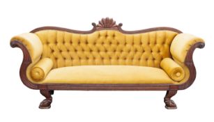 A Regency carved mahogany and upholstered sofa,