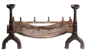 WITHDRAWN LOT A substantial cast iron dog grate in Gothic taste,