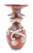 A Japanese Kutani 'dragon' vase with slender neck and everted rim,
